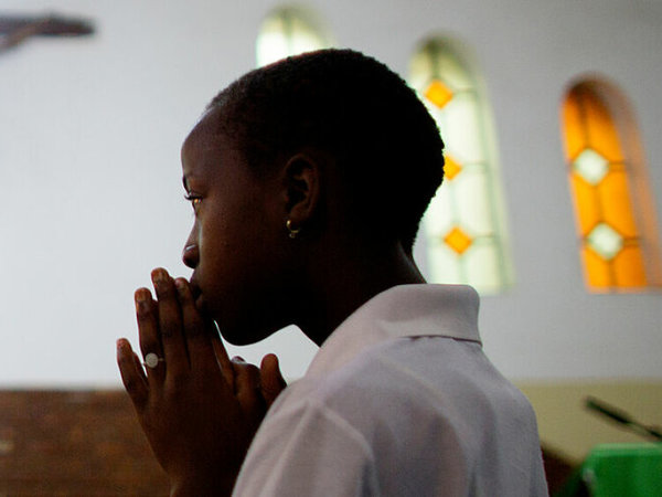 Girl praying - St Francis of Assisi resource cover