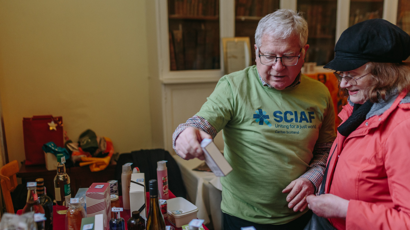 Nick Mara helping at a SCIAF coffee morning
