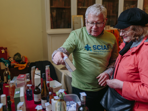 Nick Mara helping at a SCIAF coffee morning