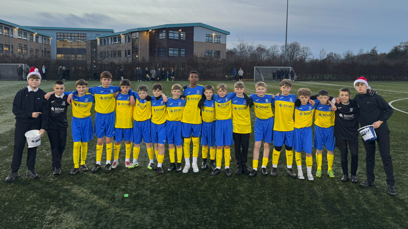 Holy Cross SCIAF football shirts