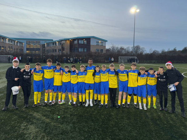 Holy Cross SCIAF football shirts