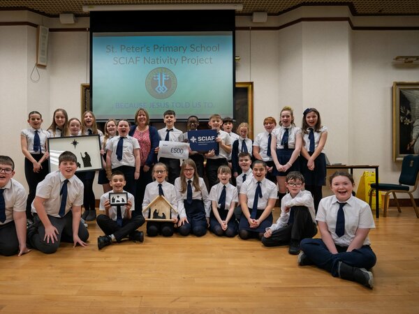 St Peters Primary pupils smiling at camera