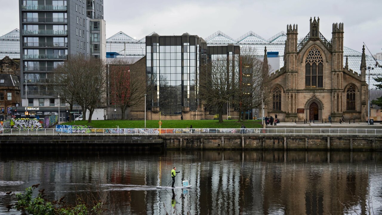 Mark SUP past SCIAF office